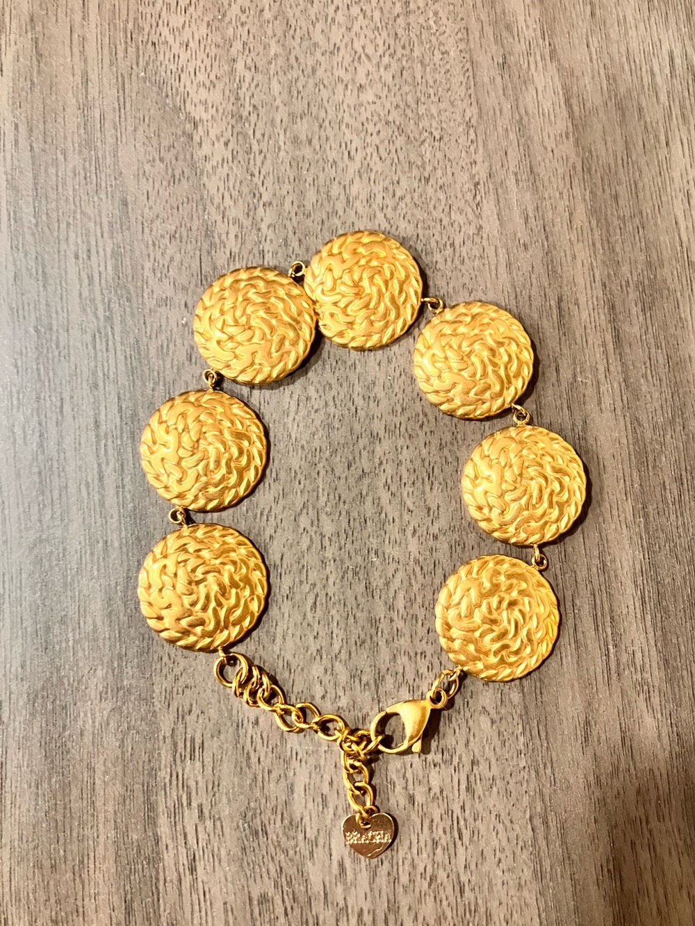 Gold medallion bracelet